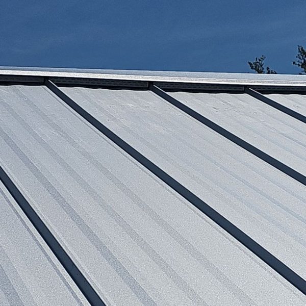Light silver metal roof panel color, close up