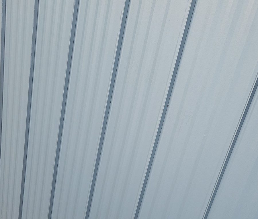 Close-up of standing seam metal roof panels with no visible screws